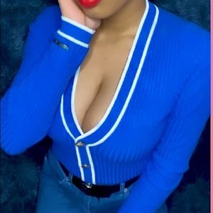 Royal Blue Express Sweater with white lining and gold emblem buttons.